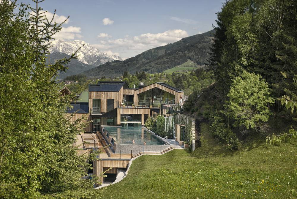 Panoramic view over the 25 m sports pool of the Naturhotel Forsthofgut