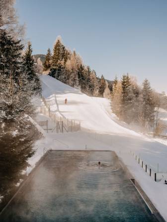 Enjoy wellness and sun - outdoor pool of the wellnesshotel in Austria Forsthofgut