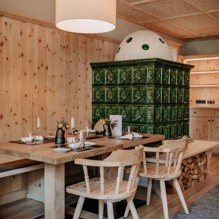 Interior view of the restaurant with wood-fired oven at the Naturhotel Forsthofgut