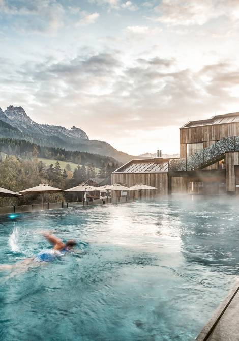 Panoramic view over the 25 m sports pool of the Naturhotel Forsthofgut